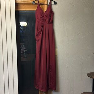 Burgundy Abby Paris formal dress size 8. Zipup back, slit down left leg. Lined.